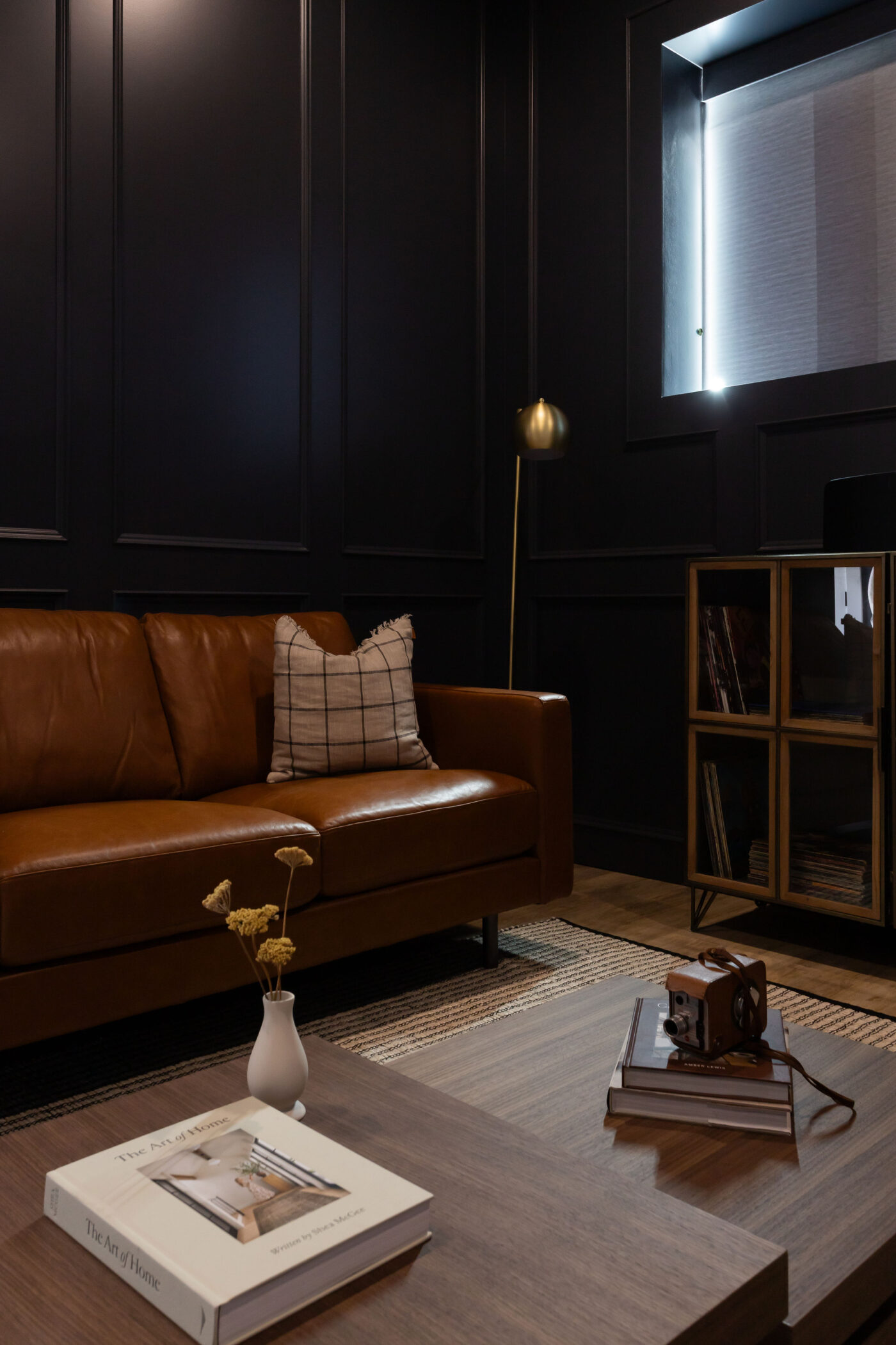 Modern Custom Home Lounge with Dark Accents and Feature Walls in Kamloops Region