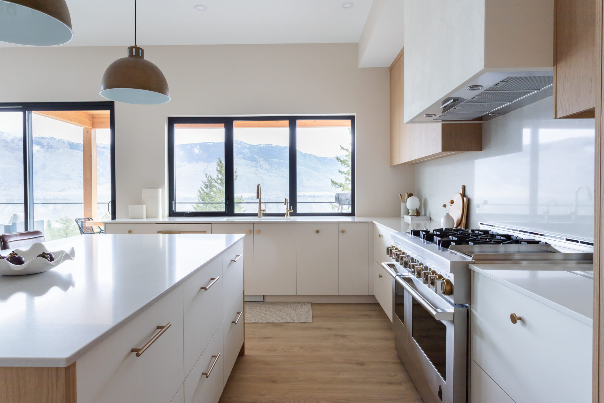 Bright open-concept kitchen overlooking the Kamloops valley in a custom build